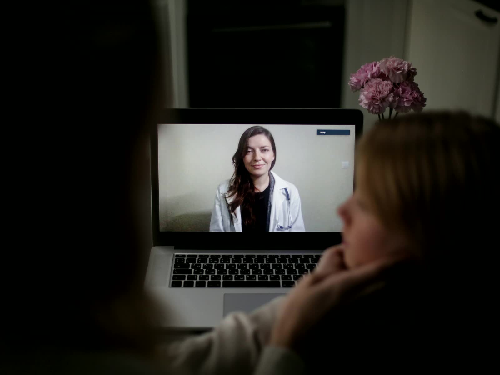 A doctor reviewing a case with a patient